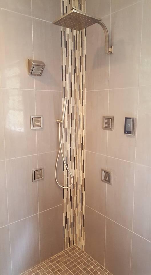 Modern shower with rainfall head and vertical tile design