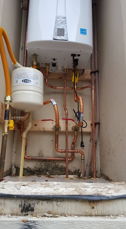 New water heater installation with copper pipes