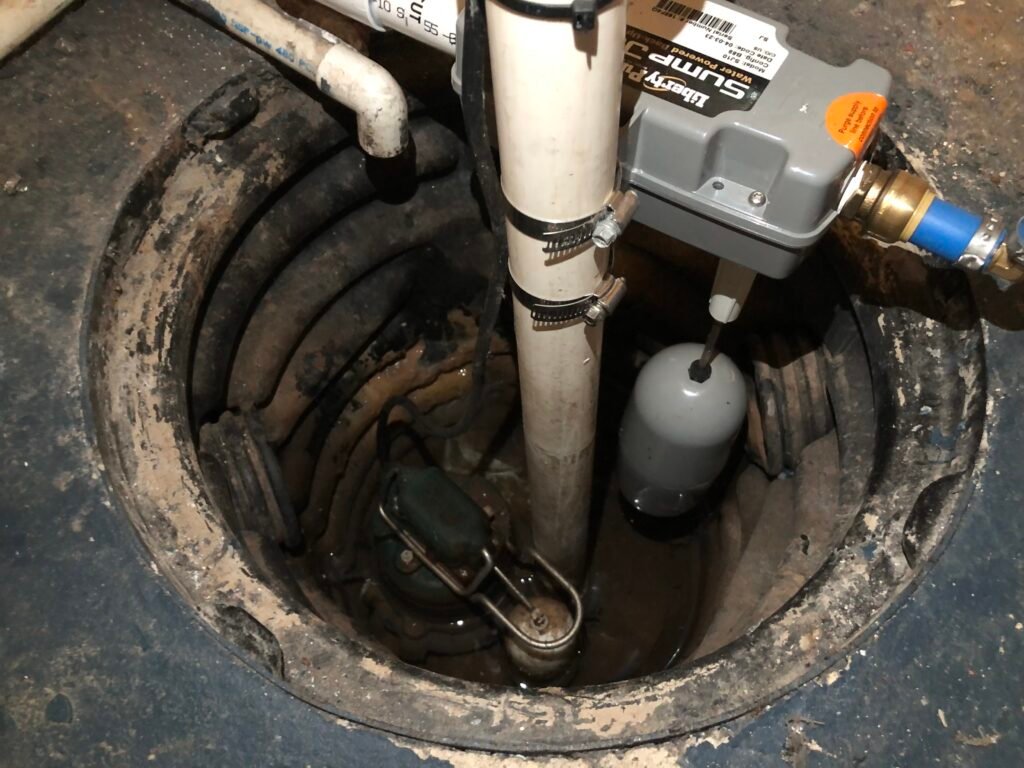 Sump pump installed in a basement pit