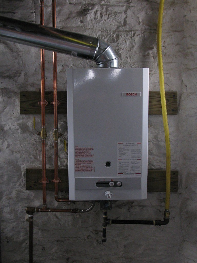 Bosch wall-mounted gas heating unit in basement